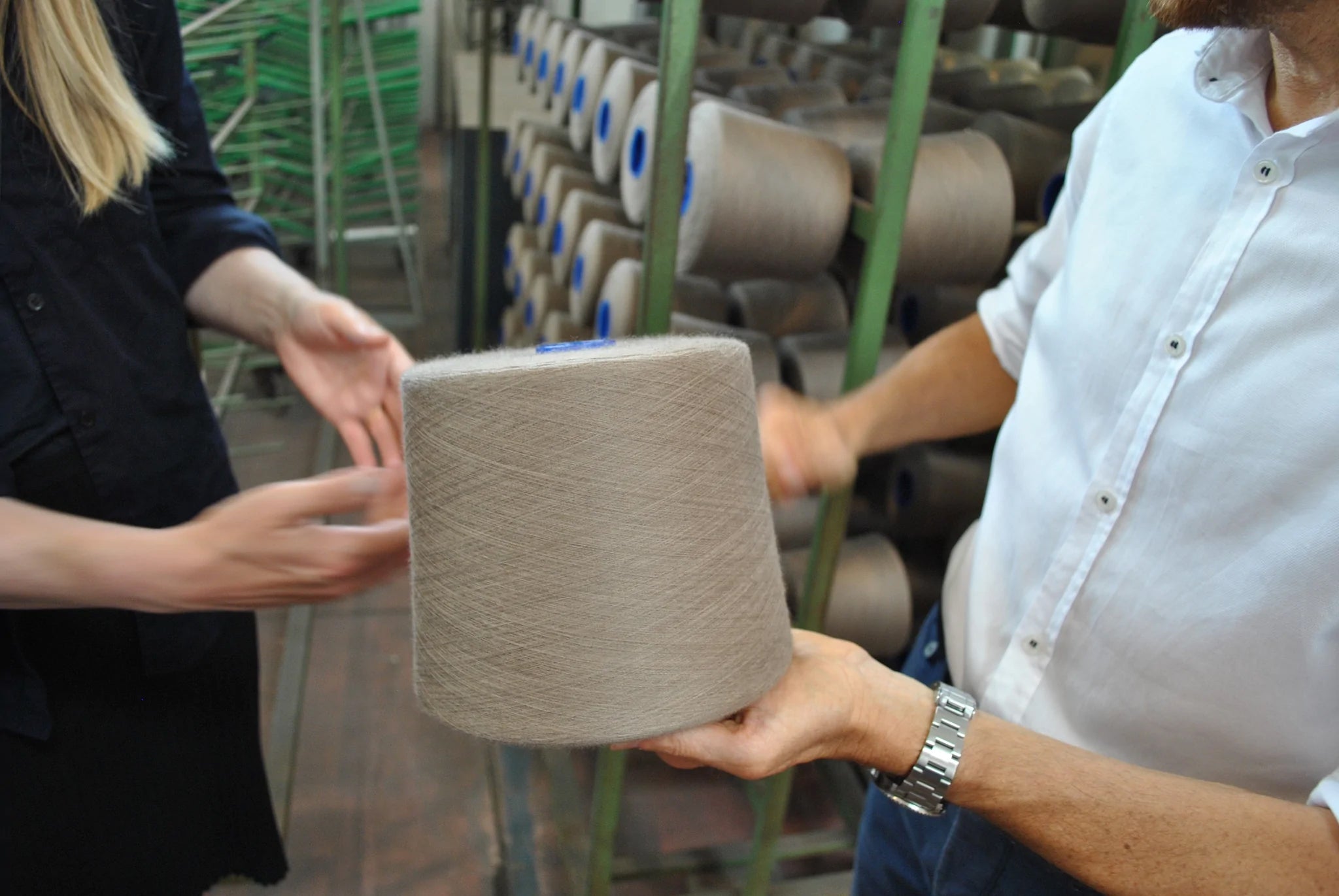 Inspecting a finished yarn cone